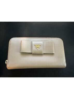 PRADA BOW BEIGE SAFFIANO LEATHER LONG ZIP WALLET